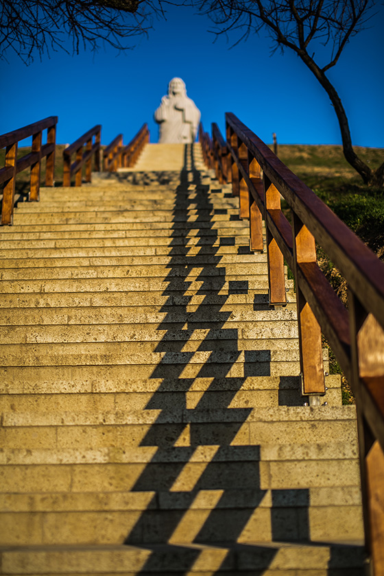 Statue of the Blessing Jesus on top of a hill above the village of Tarcal